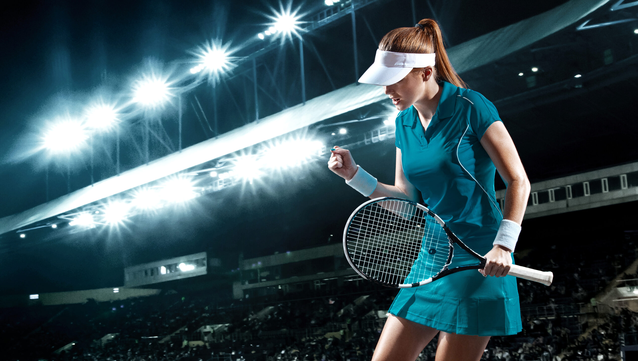 Female athlete relishing a dominating victory after engaging in mental visualization for tennis players.